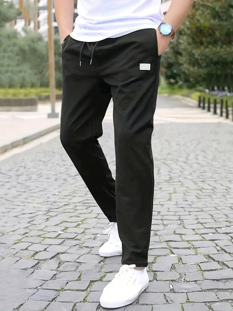 Stretch jogging pants, sporty and fashionable, with drawstring and relaxed waist