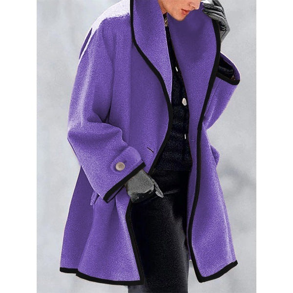 Stylish coat with contrast piping
