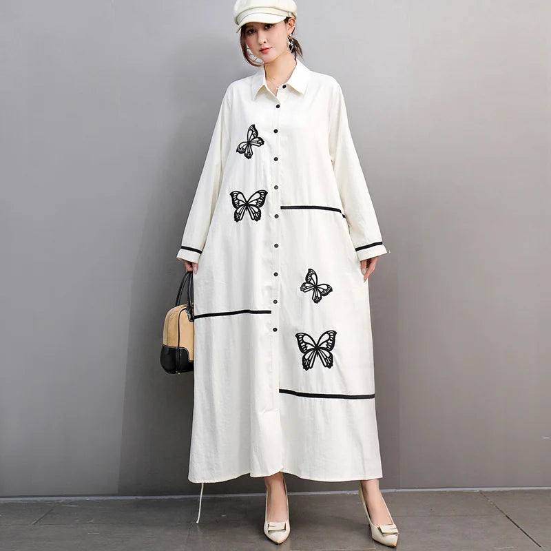 Women's blouse with elegant butterfly embroidery