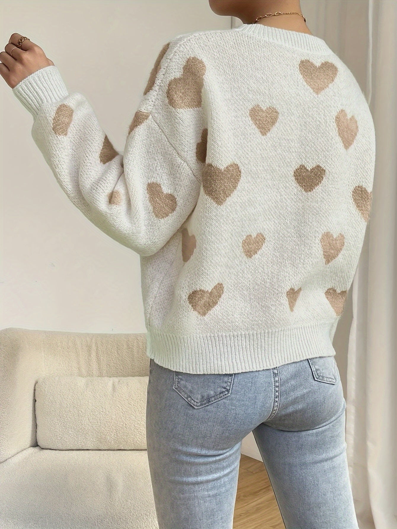 Cozy knitted sweater with heart design