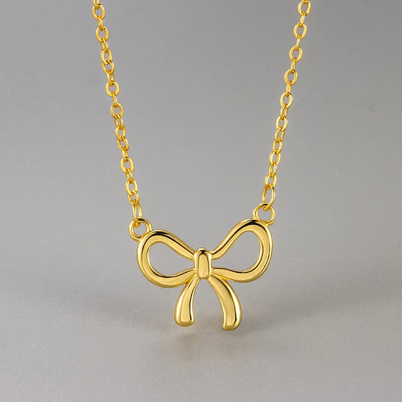 Women's copper necklace with cutout bow design - TrendAura