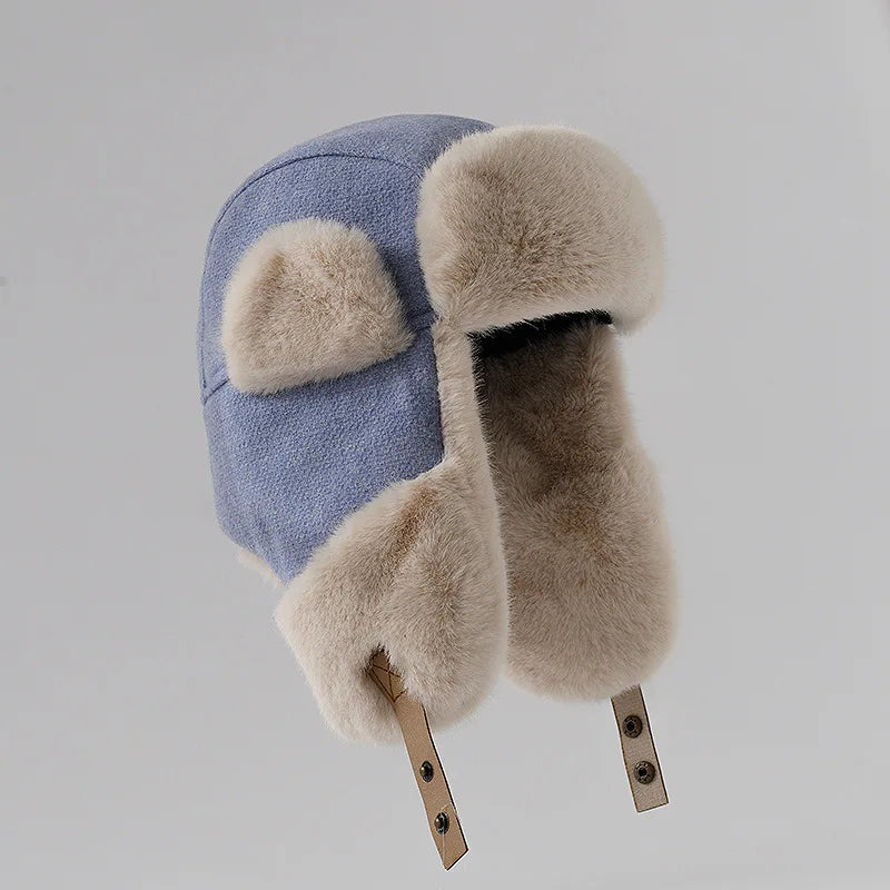 Warm women's hat made of faux fur