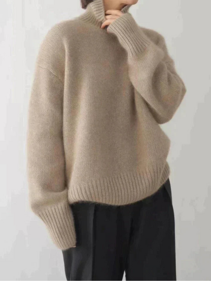 Women's turtleneck sweater in trendy oversized look for autumn and winter, casual and elegant