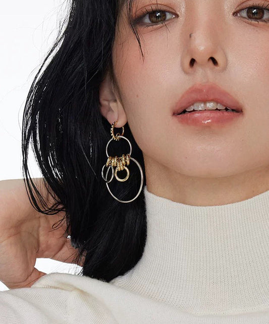 Boucles d'oreilles créoles asymétriques en argent sterling 2025 - TrendAura