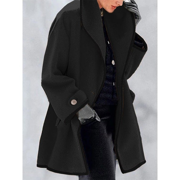 Stylish coat with contrast piping