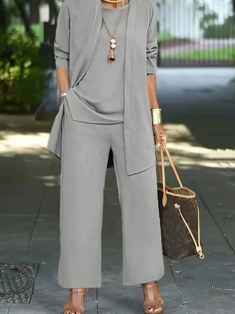 Sara – Stylish sleeveless top with round neckline and long jacket set with wide pantsuit