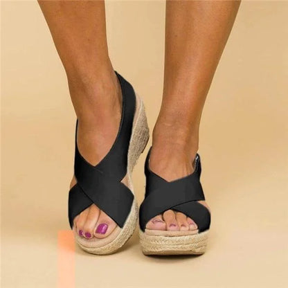 Wedge sandals with woven sole