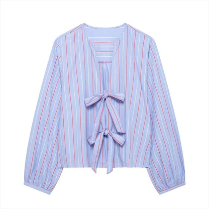 Carina | Women's blouse with stripes and bow detail for casual outfits