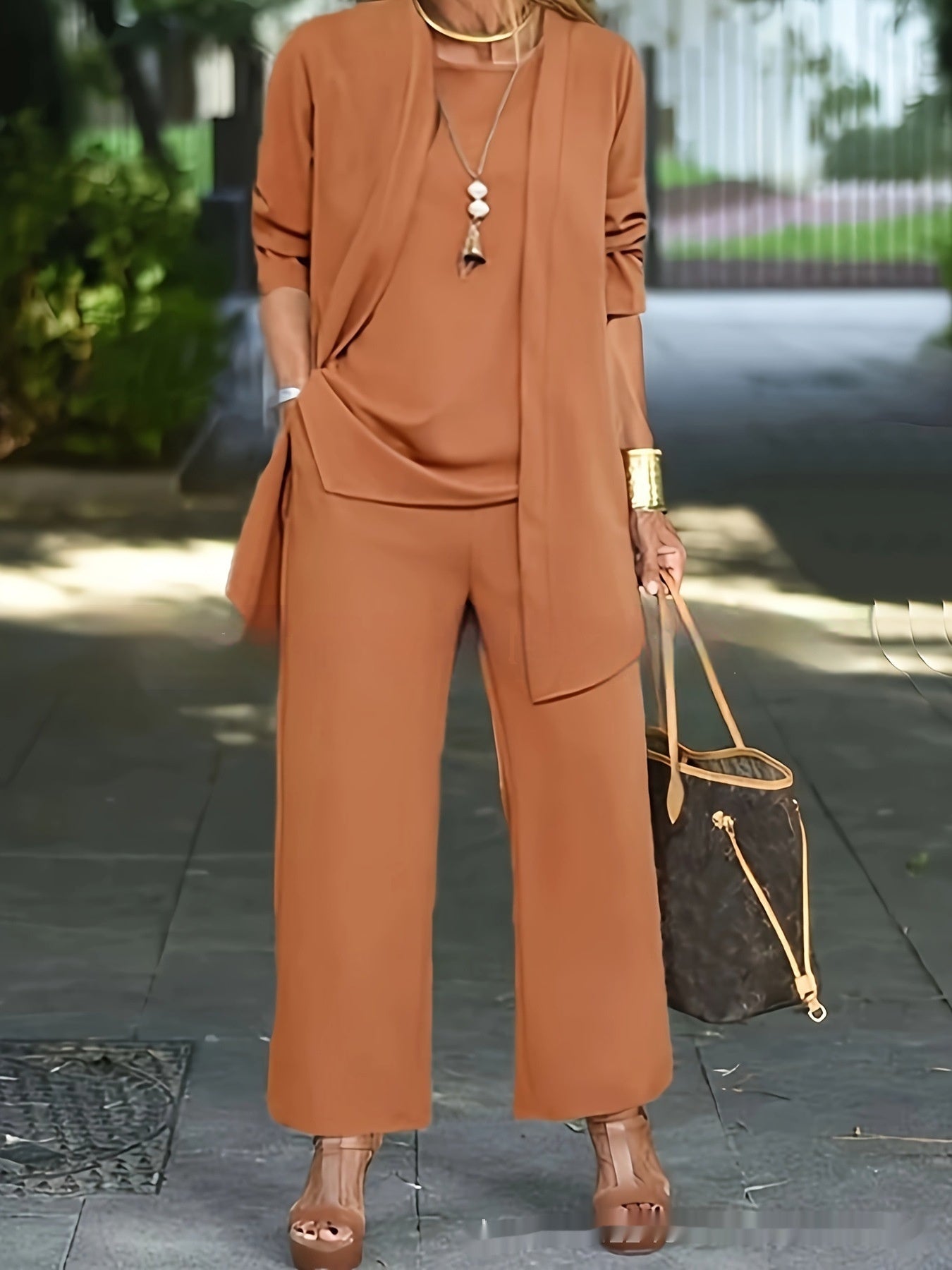 Sara – Stylish sleeveless top with round neckline and long jacket set with wide pantsuit