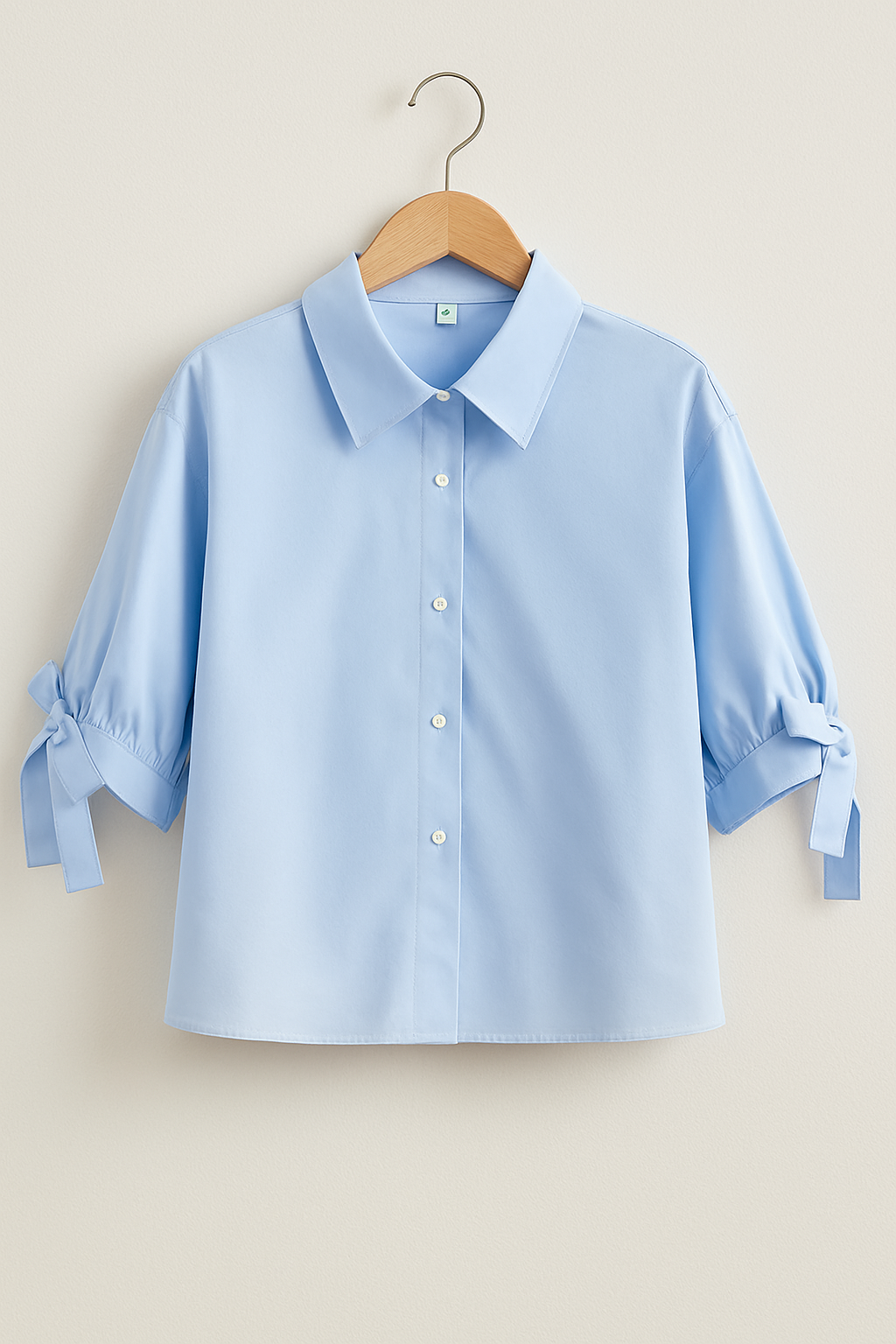 Women's blouse with bow sleeves