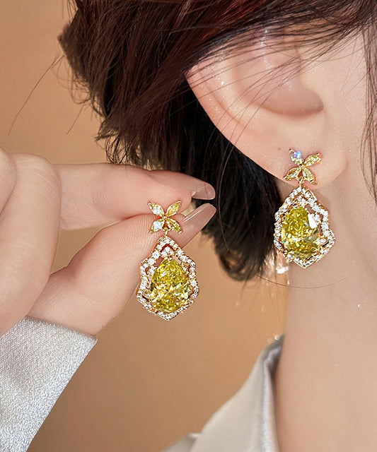 Boucles d'oreilles pendantes en cristal et cuivre jaune surdoré, trèfle à quatre feuilles - TrendAura