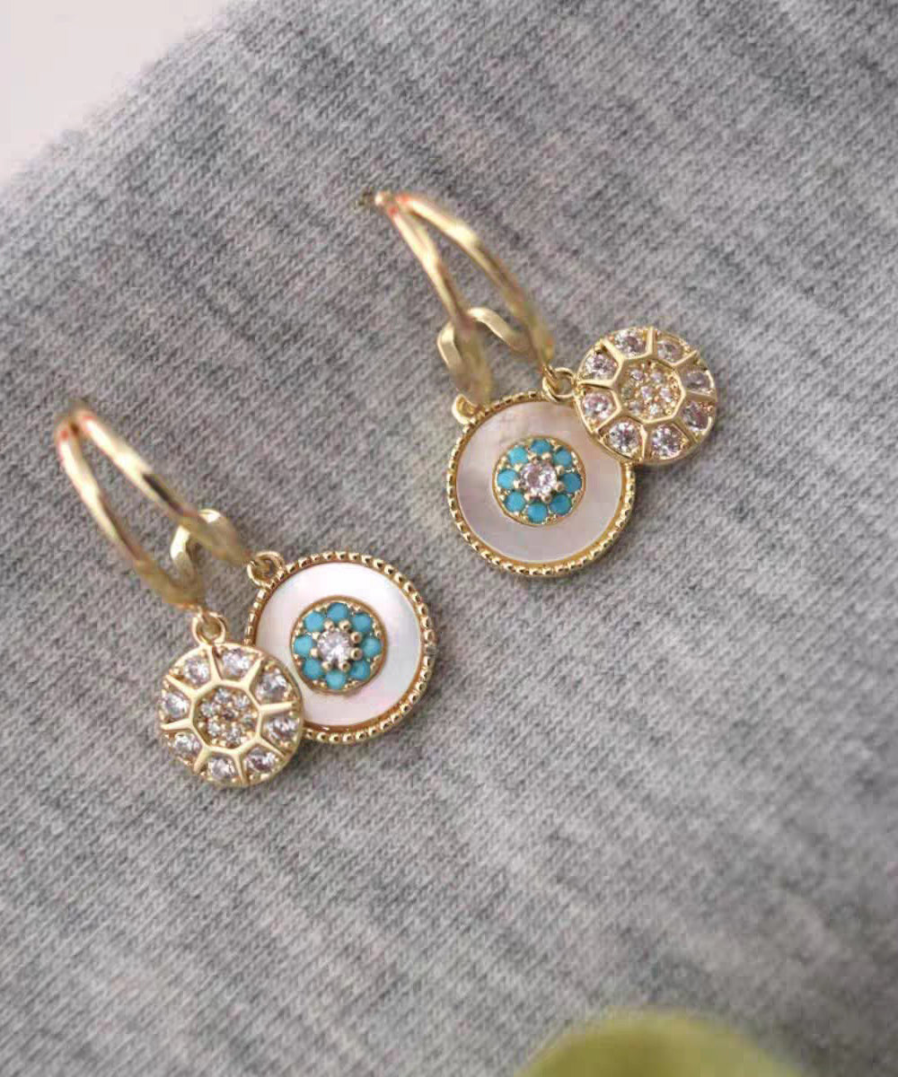 Magnifiques boucles d'oreilles pendantes en forme de coquillage en zircon surdoré et cuivre doré - TrendAura