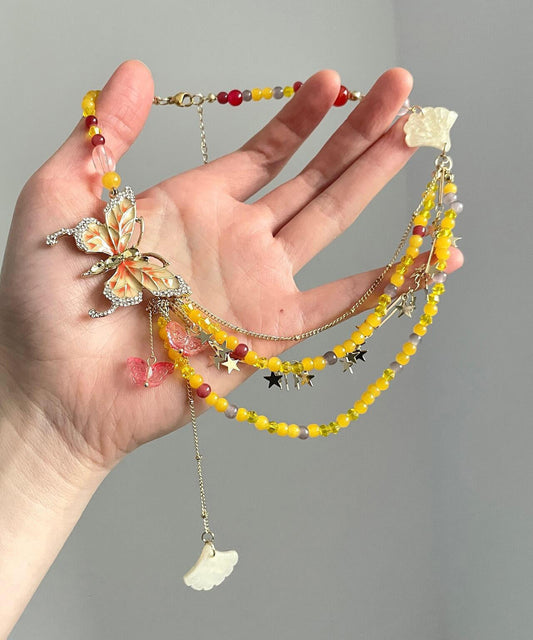 Magnifique collier avec pendentif papillon et étoile en alliage de zircon jaune - TrendAura