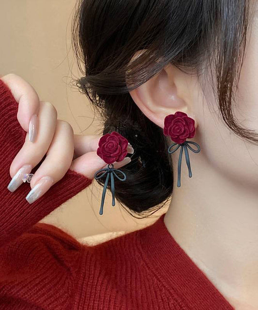 Boucles d'oreilles à tige style bohème en alliage de cuivre rouge avec nœud rose floqué - TrendAura