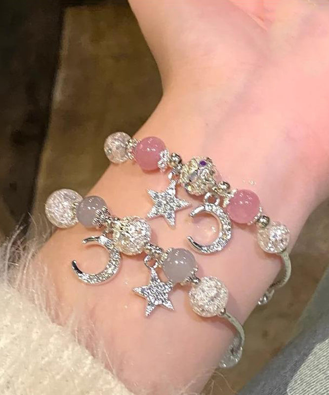 Ensemble de deux bracelets à breloques en alliage avec perles, lune, étoiles et pompons - TrendAura