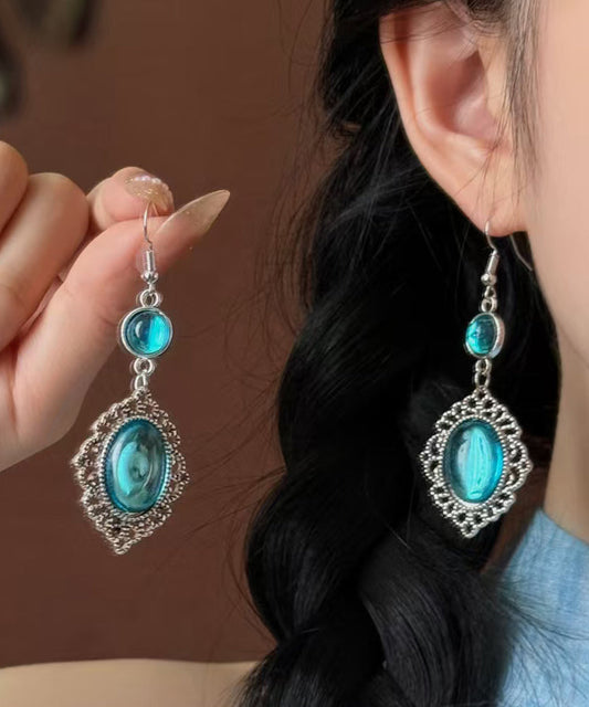 Boucles d'oreilles pendantes creuses en argent sterling bleu avec pierres précieuses - TrendAura