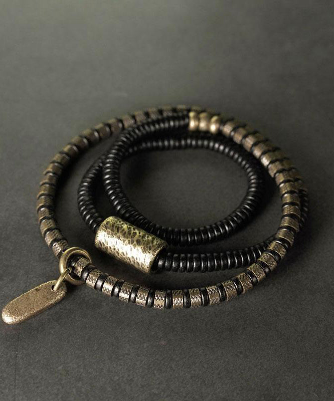 Bracelet Boutique Colorblock en perles de cuivre doré antique et breloques en bois de santal - TrendAura