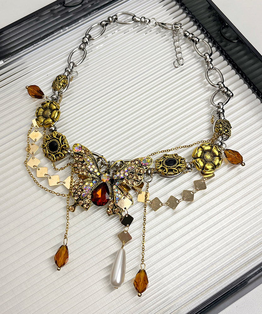 Collier avec pendentif papillon et pompon en alliage d'or et zircons - TrendAura