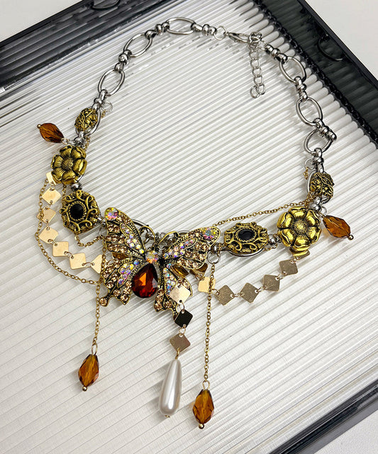 Collier avec pendentif papillon et pompon en alliage d'or et zircons - TrendAura