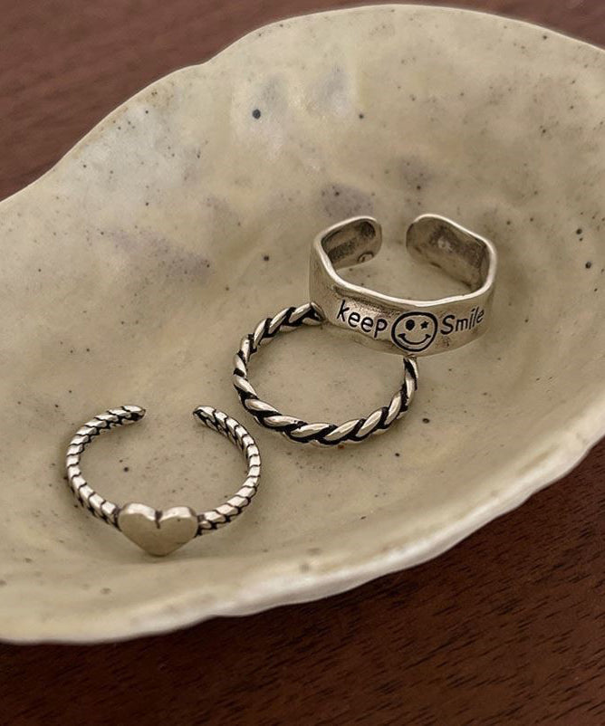 Ensemble de trois bagues en argent sterling Boutique Silk avec motif « Amour, visage souriant et torsades de pâte frite » - TrendAura
