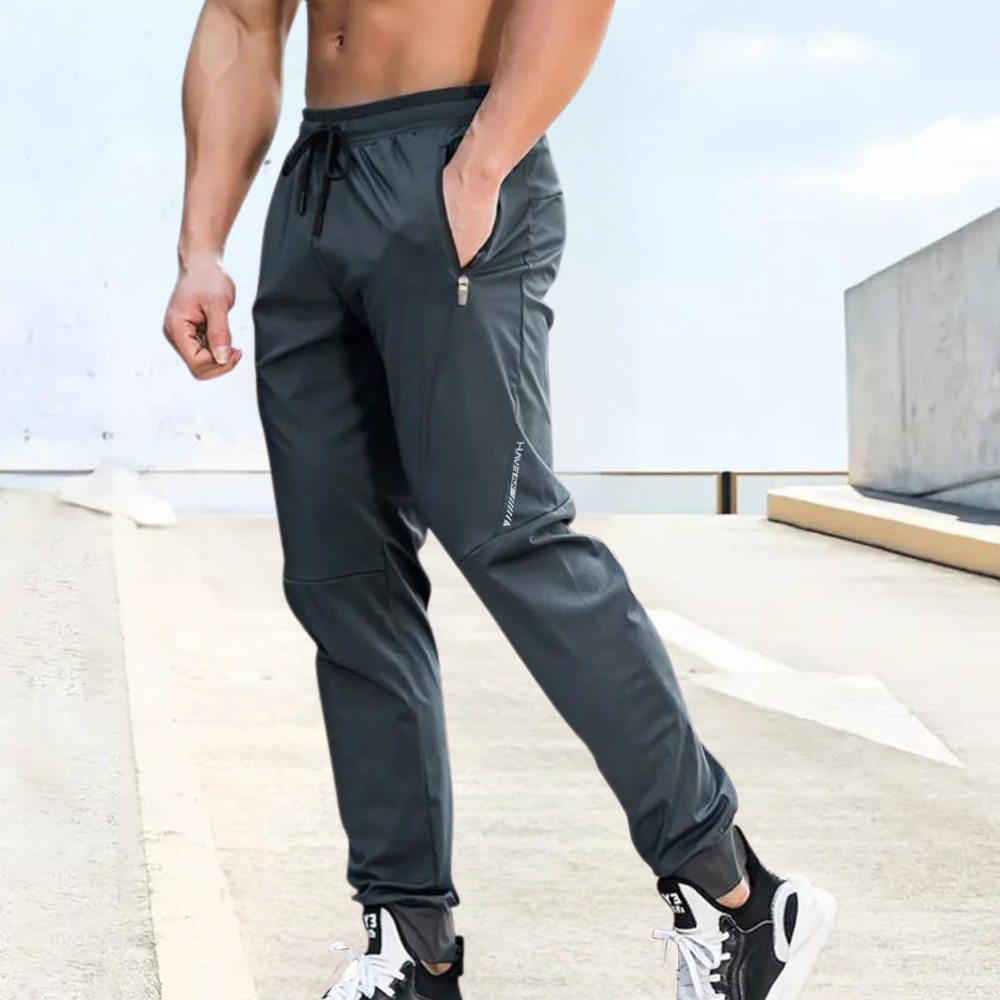 TrendAura Mens Slim Fit Jogging Pants with Elastic Drawstring Waist Zipper Pockets Breathable