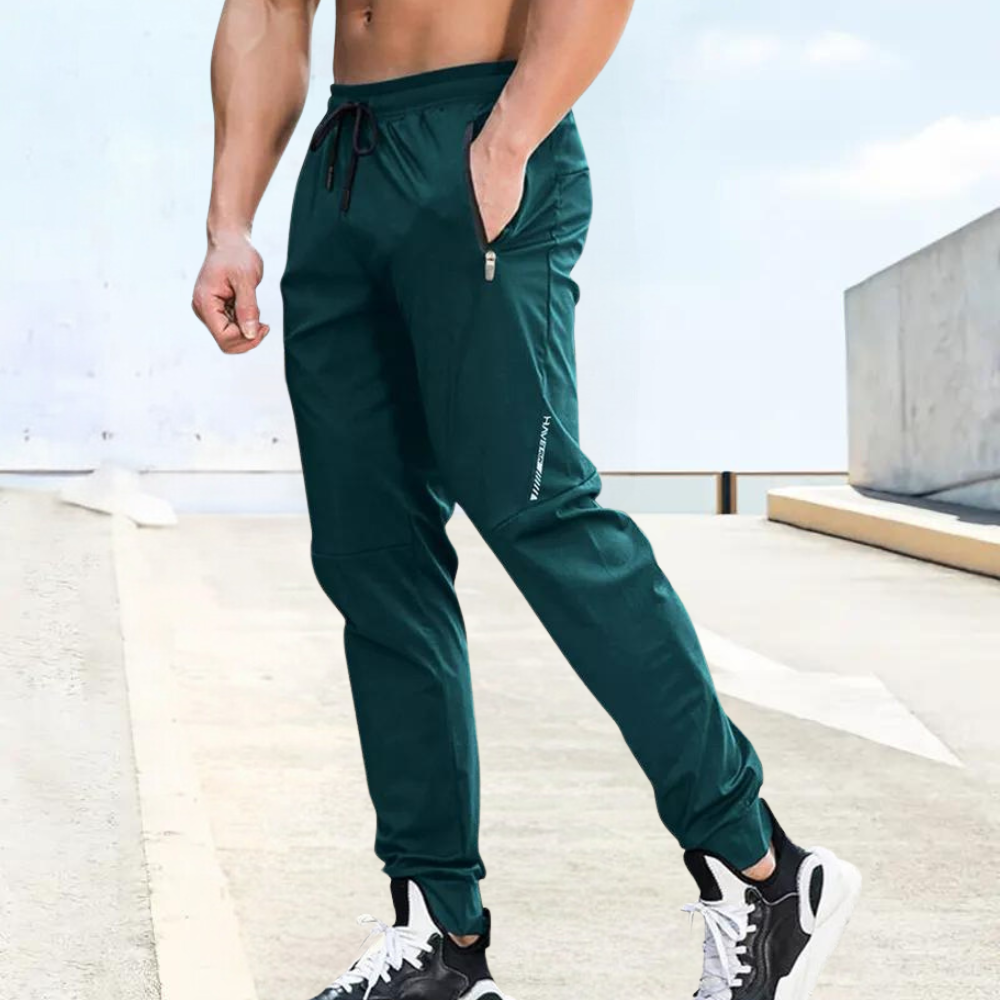 TrendAura Mens Slim Fit Jogging Pants with Elastic Drawstring Waist Zipper Pockets Breathable