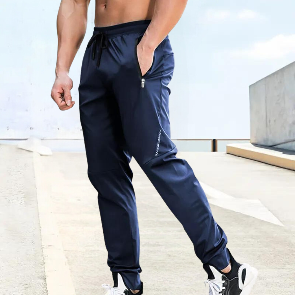 TrendAura Mens Slim Fit Jogging Pants with Elastic Drawstring Waist Zipper Pockets Breathable