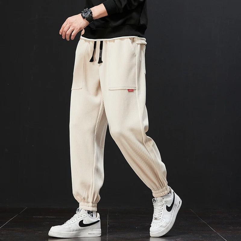 Corduroy sweatpants with adjustable waistband and deep pockets