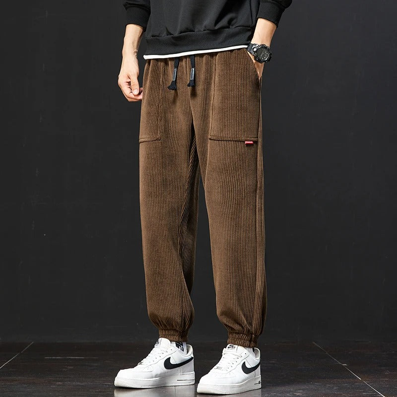 Corduroy sweatpants with adjustable waistband and deep pockets