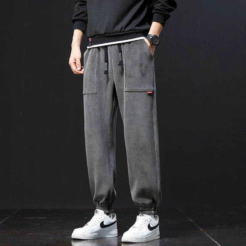 Corduroy sweatpants with adjustable waistband and deep pockets