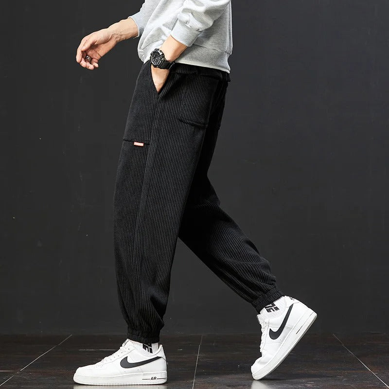 Corduroy sweatpants with adjustable waistband and deep pockets