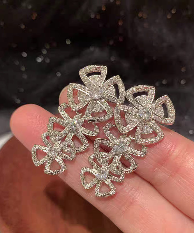 Boucles d'oreilles à tige décontractées en acier inoxydable blanc avec zircon et nœud creux - TrendAura