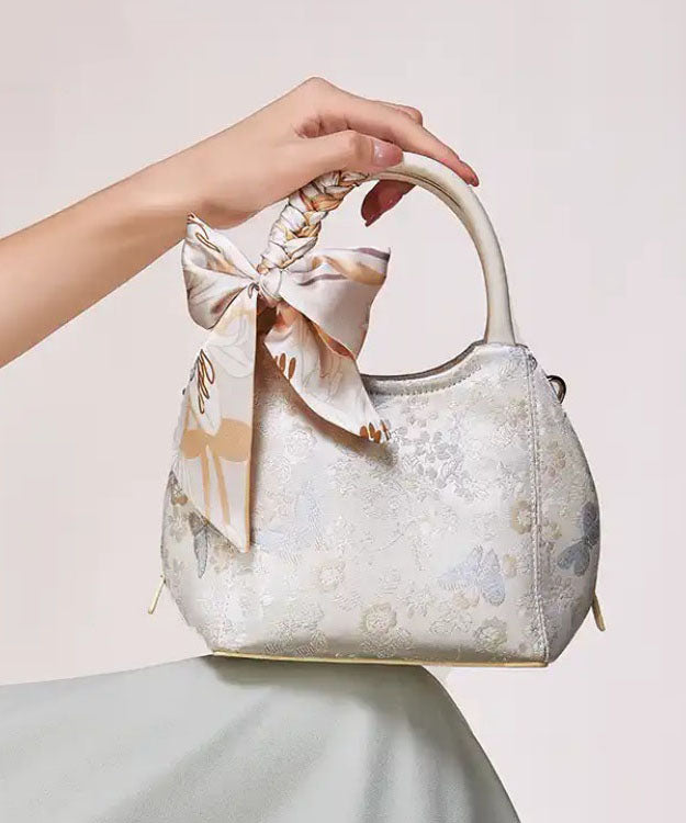 Sac fourre-tout chic en coton jacquard beige avec nœud - TrendAura