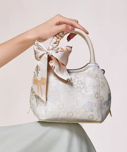 Sac fourre-tout chic en coton jacquard beige avec nœud - TrendAura