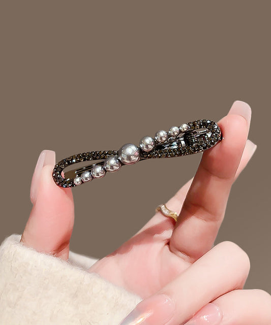 Épingle à cheveux chic en alliage de métal noir, zircon et perle, avec nœud papillon. - TrendAura