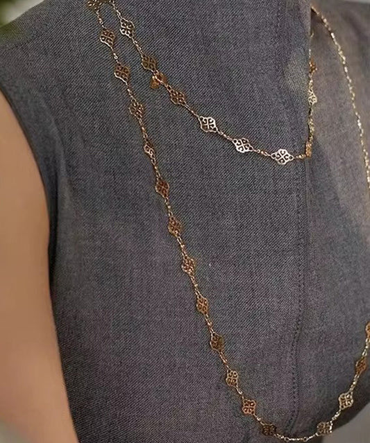 Collier lariat chic en cuivre doré et doré avec motif floral ajouré - TrendAura