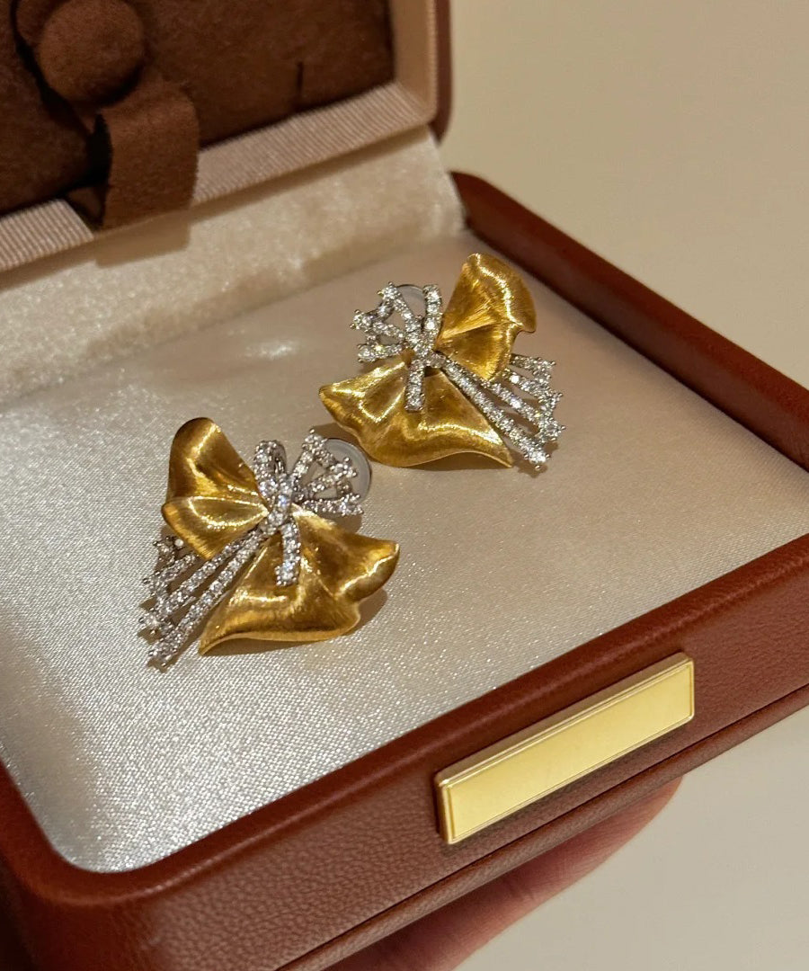 Boucles d'oreilles à tige asymétriques chics en or, cuivre et zircon - TrendAura