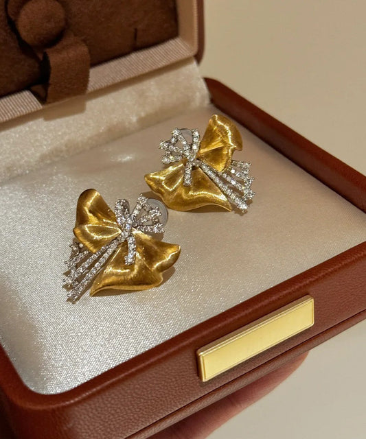 Boucles d'oreilles à tige asymétriques chics en or, cuivre et zircon - TrendAura