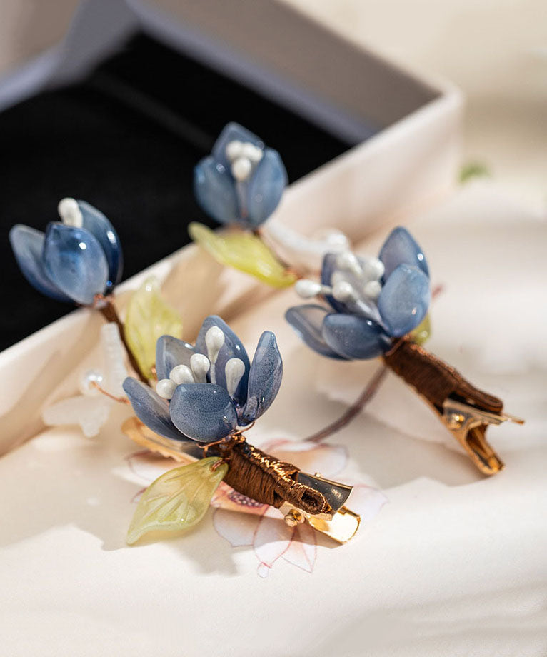 Paire d'épingles à cheveux lotus en cuivre bleu doré de style chinois, à glaçure nacrée. - TrendAura