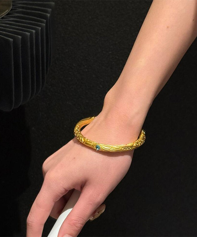 Bracelet jonc doré antique de style chinois - TrendAura