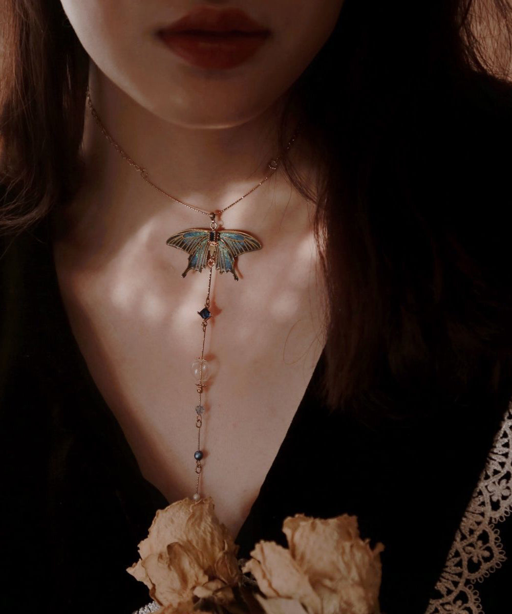 Collier avec pendentif en forme d'aile en perles de verre et zircon doré de style chinois - TrendAura