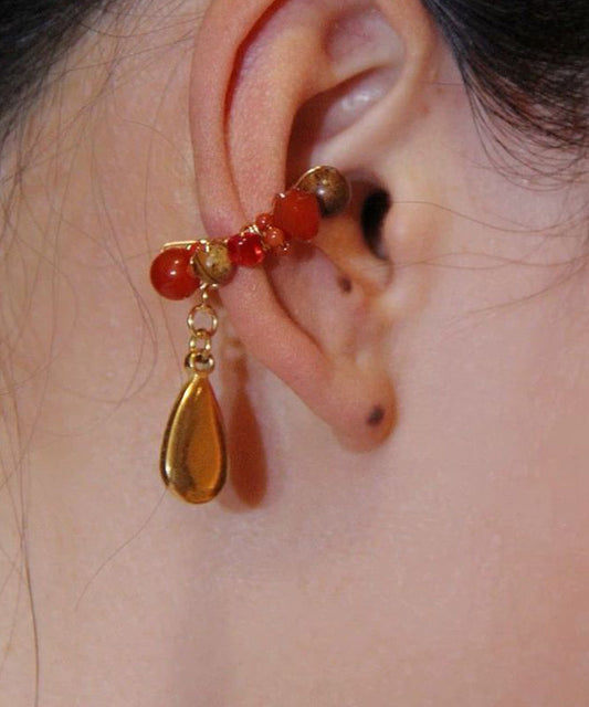 Boucles d'oreilles créoles en forme de goutte d'eau en acier inoxydable doré de style chinois - TrendAura