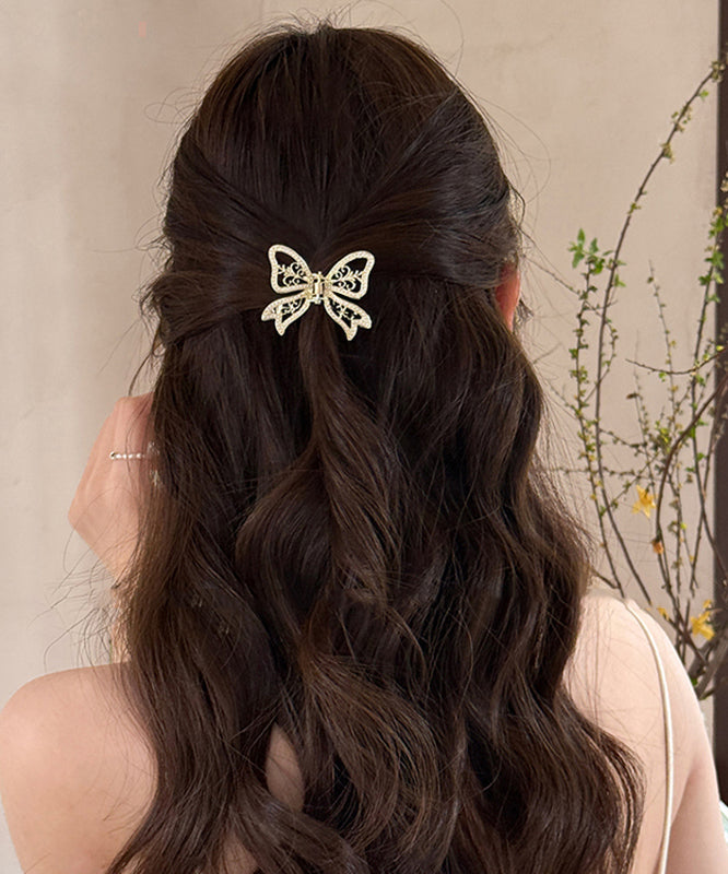 Épingle à cheveux élégante en alliage d'or avec perle et papillon ajouré - TrendAura