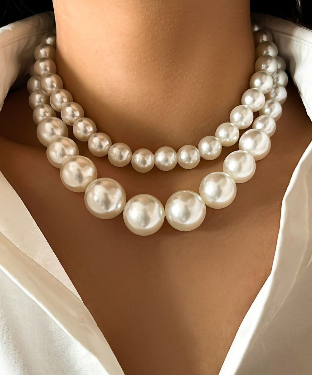 Collier élégant en acier inoxydable blanc avec perles et pompons - TrendAura