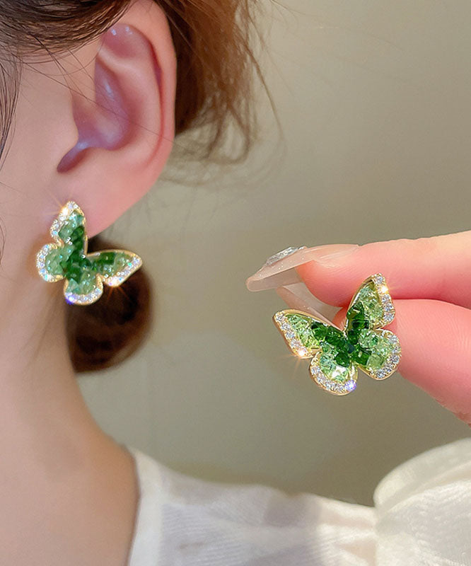 Boucles d'oreilles à tige en forme de papillon en cristal de zircon vert et cuivre - TrendAura