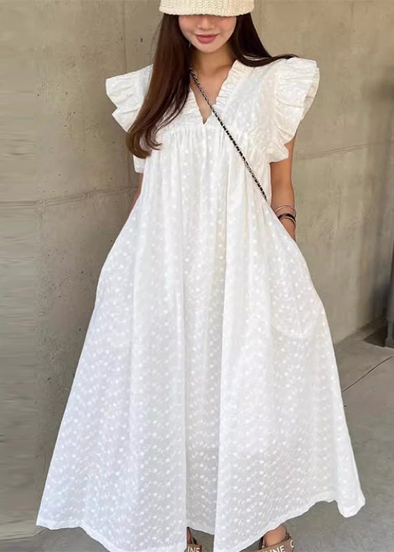 Jolie robe de vacances en coton à volants et pois blancs sans manches - TrendAura