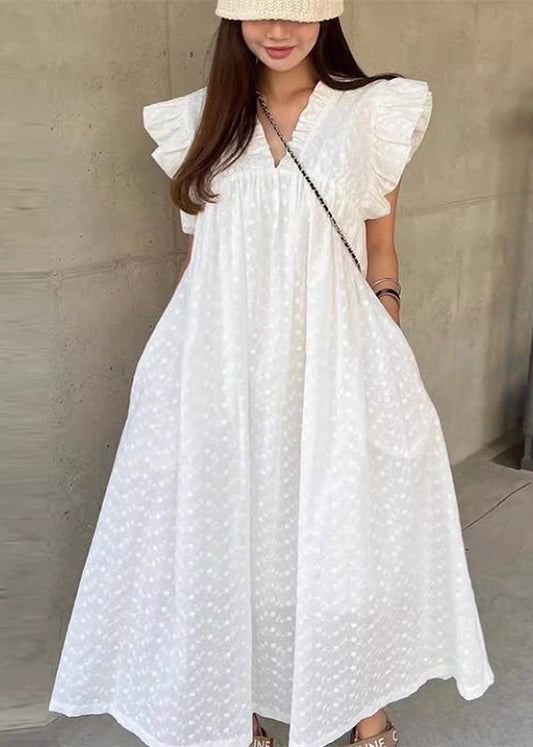 Jolie robe de vacances en coton à volants et pois blancs sans manches - TrendAura