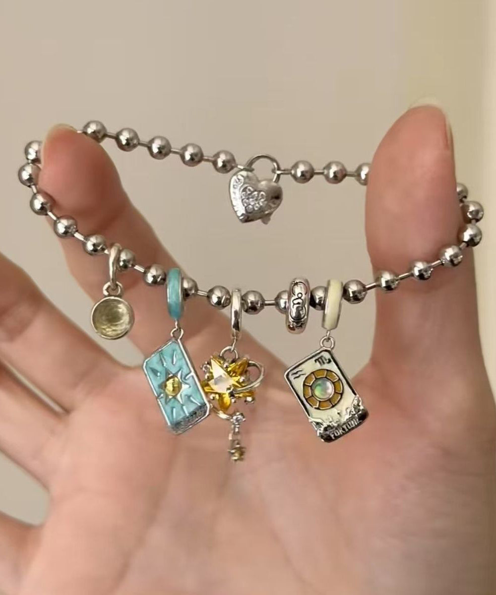 Bracelet à breloques en soie et acier inoxydable DIY « Le soleil, la lune et les étoiles » - TrendAura