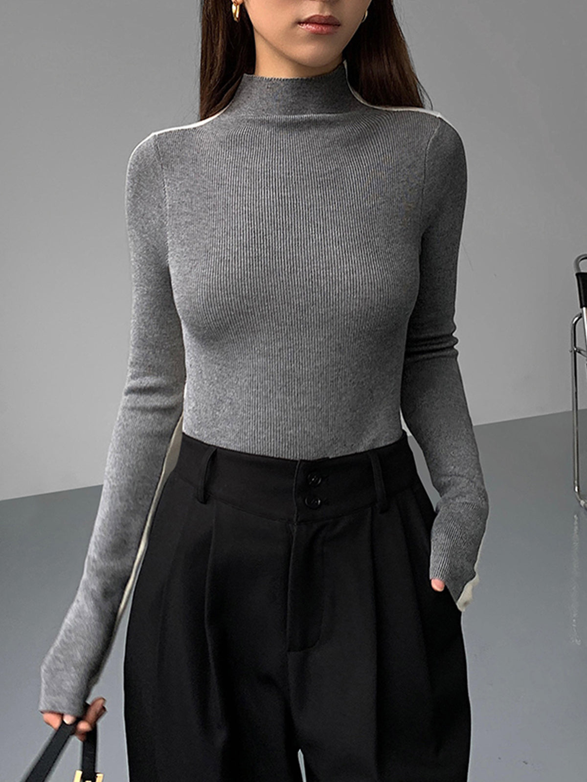 Women's knitted top with long sleeves
