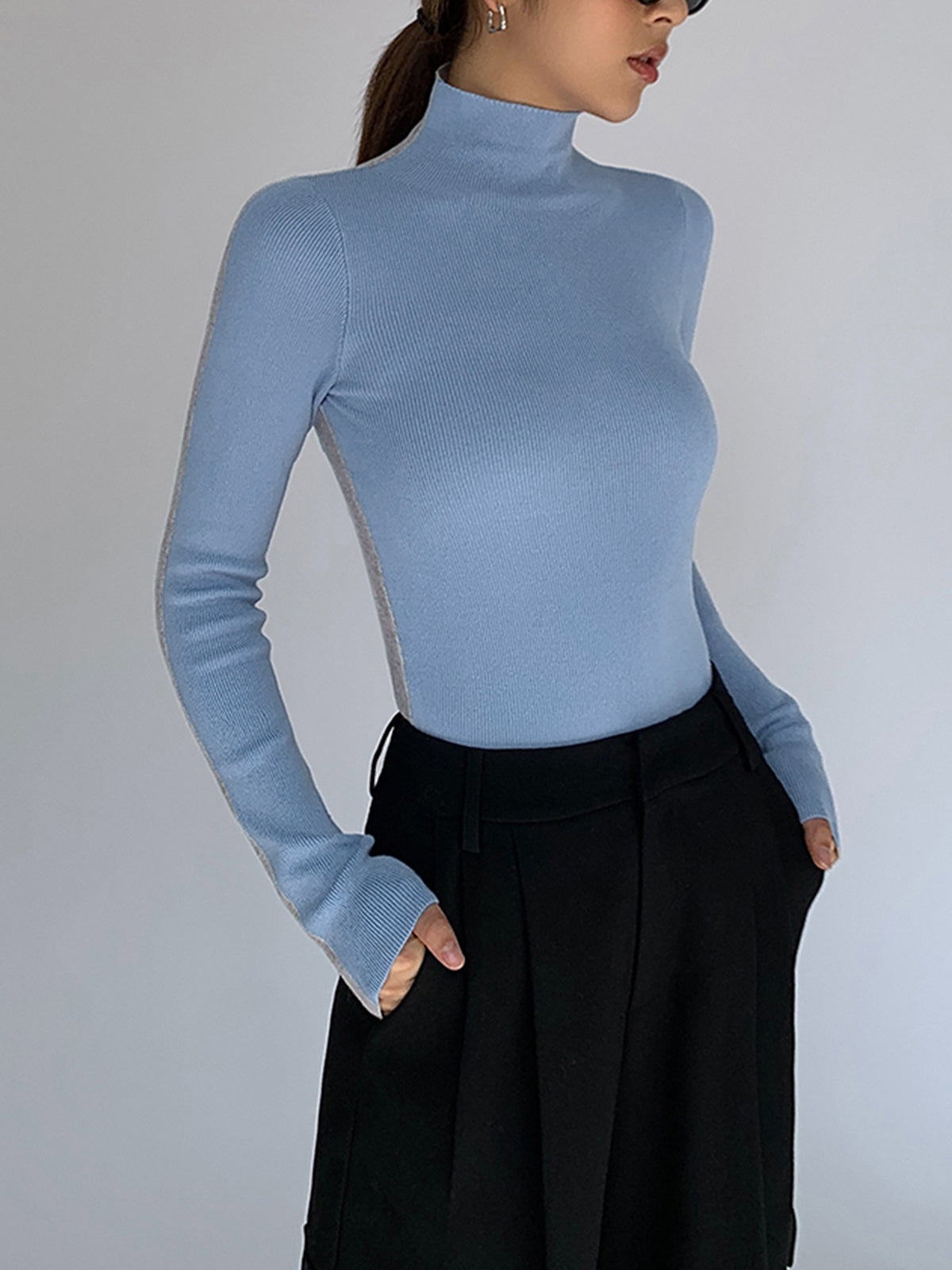 Women's knitted top with long sleeves